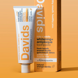 Davids toothpaste tube and packaging on a beige background