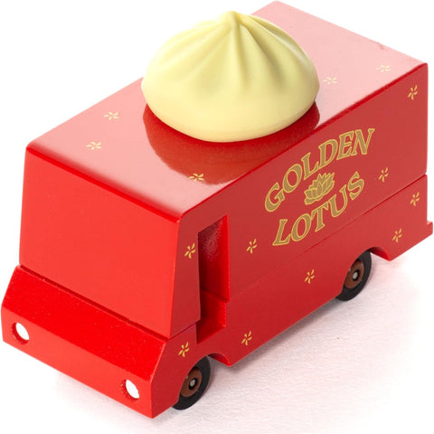 Red toy truck with a yellow dumpling on top, branded 'Golden Lotus', on a white background