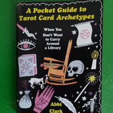 Cover of the zine 'Pocket Guide To Tarot Card Archetypes' featuring various tarot card illustrations, a skull, and a chair.