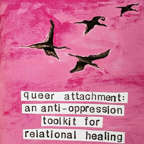 A book titled 'queer attachment: an anti-oppression toolkit for relational healing' by Leah Jo Carnine and Fizz Perkal, featuring a pink cover with black birds and white text blocks, photographed against a solid blue background.