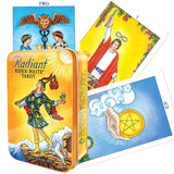 Radiant Rider-Waite Tarot deck with its illustrated tin box and three sample cards fanned out behind it on a white background.