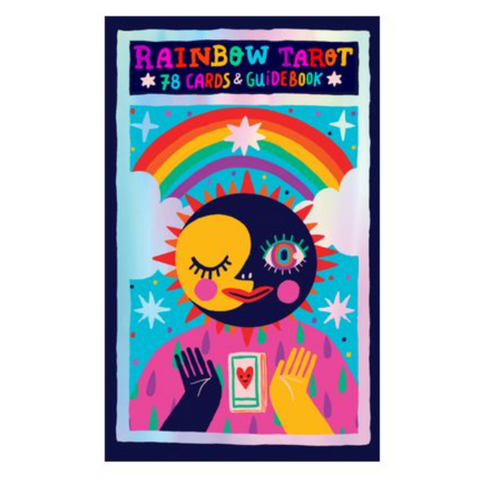 Rainbow Tarot card deck box cover featuring a colorful cartoon design with a rainbow, sun, moon, stars, and hands holding cards, on a white background.