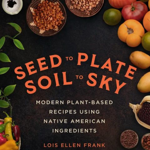 The front cover of the book 'Seed to Plate Soil to Sky' by Lois Ellen Frank, featuring a dark textured background surrounded by colorful vegetables, grains, and herbs, with the title in large orange letters.