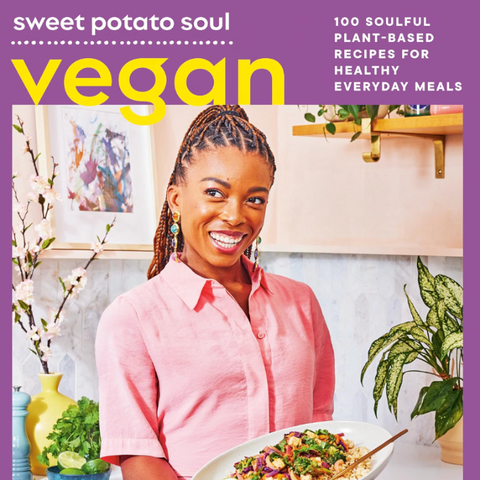 Front cover of the book 'vegan vibes' by Jenné Claiborne, featuring a purple border, a photo of a smiling woman holding a bowl of food, and large yellow title text.