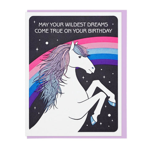 Greeting card with a unicorn and rainbow design on a black background