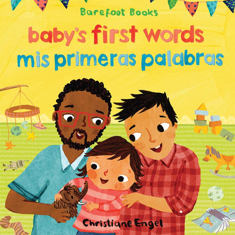 Cover of the book 'Mis Primeras Palabras, Babys First Words' featuring an illustration of a family with a baby and two adults, with various colorful objects and animals in the background.